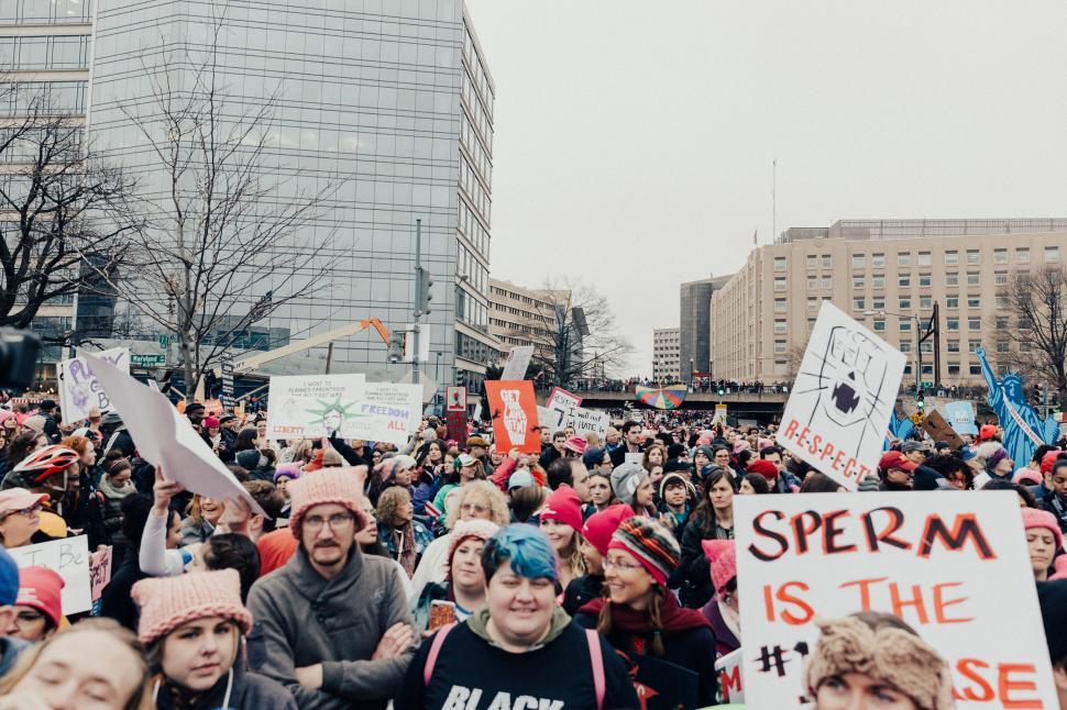 Free Image of Throng of protestors in urban setting, diverse expressions. 