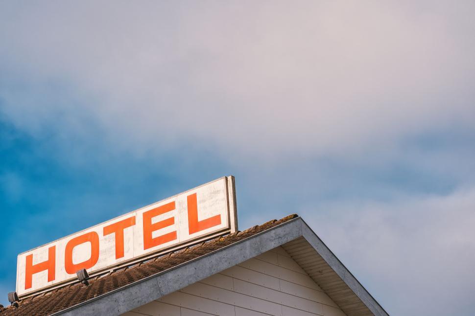Free Image of Hotel signboard on building against clear sky 