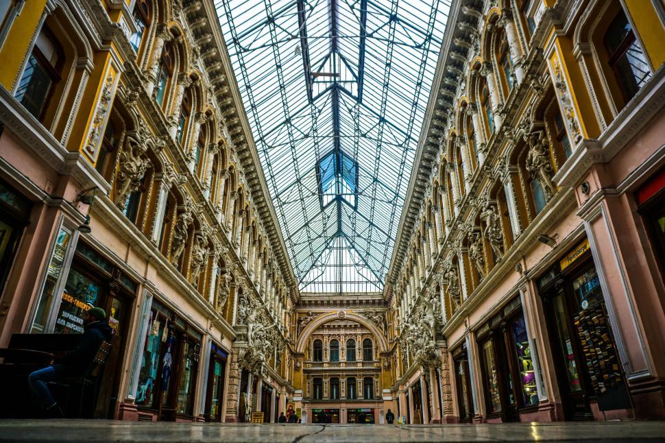 Free Image of Glass-roofed architectural passageway in mall 