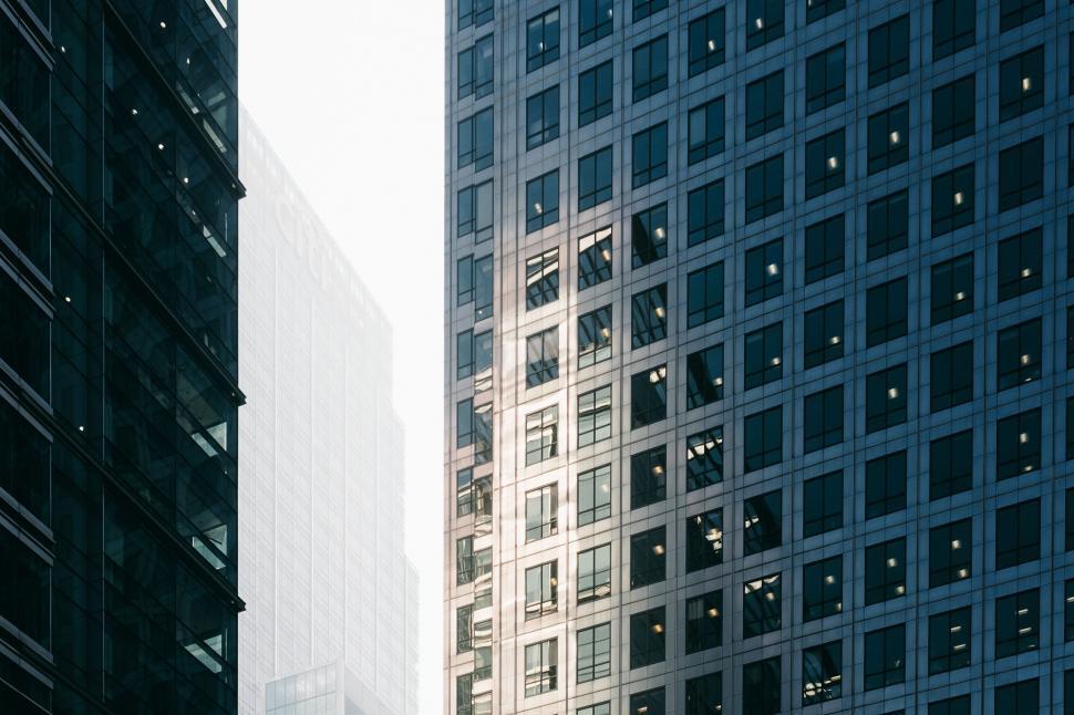 Free Image of Modern skyscrapers in an urban setting with reflective glass. 