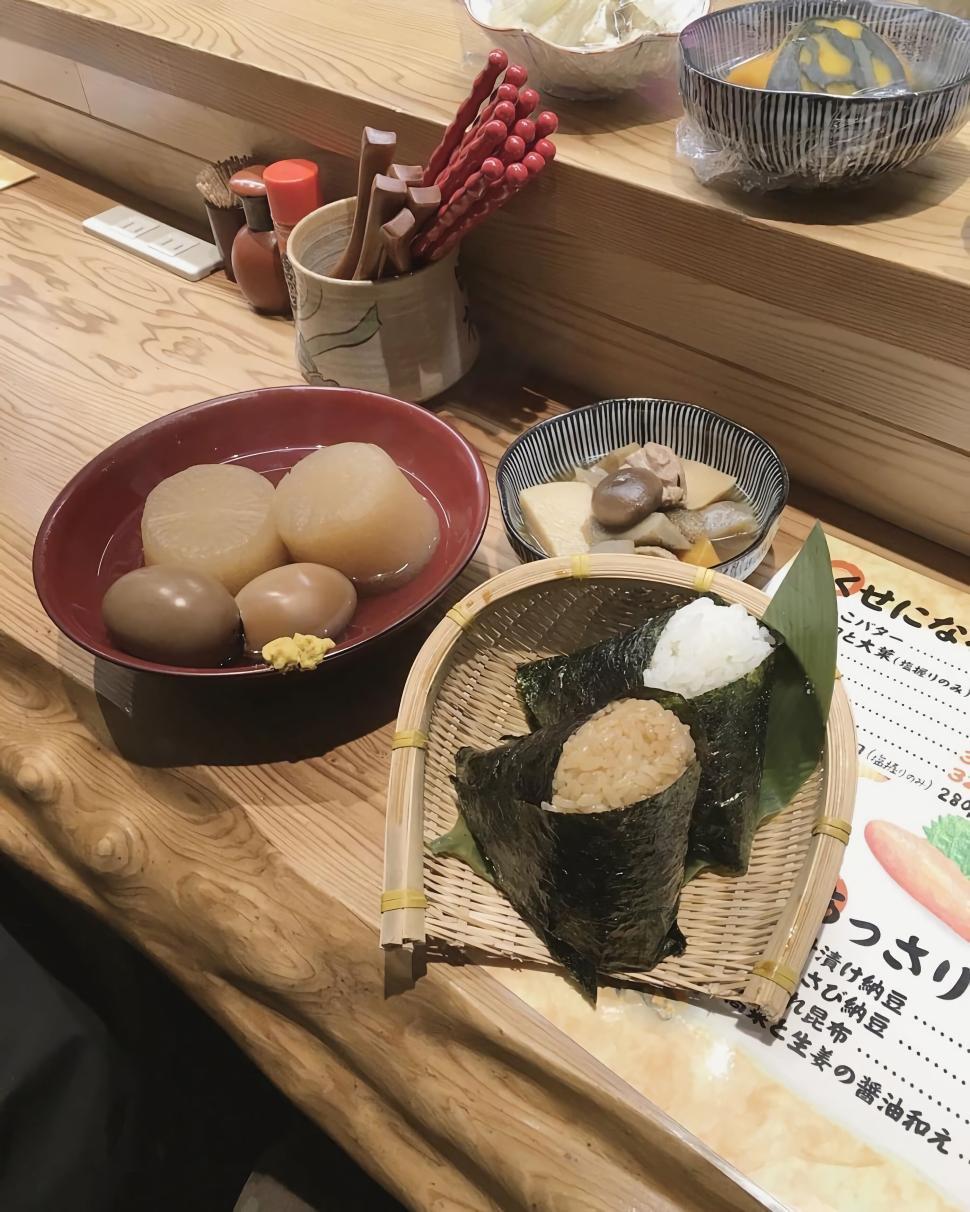 Free Image of Traditional Japanese meal with various dishes on table. 