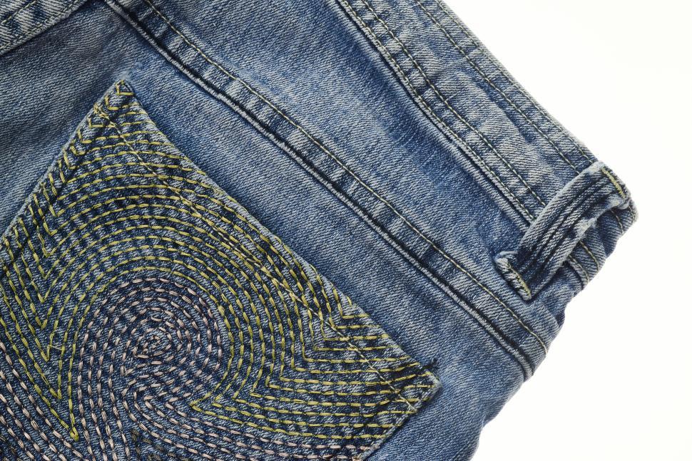 Free Image of Close-up of blue jeans with detailed pocket embroidery design 
