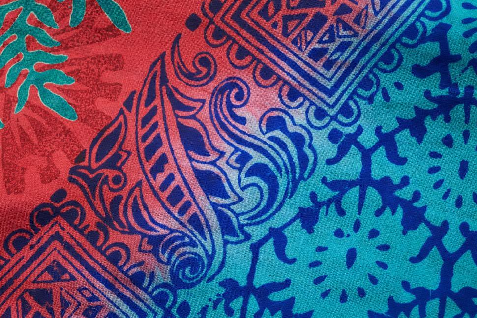 Free Image of Vibrant fabric pattern with intricate colorful designs 