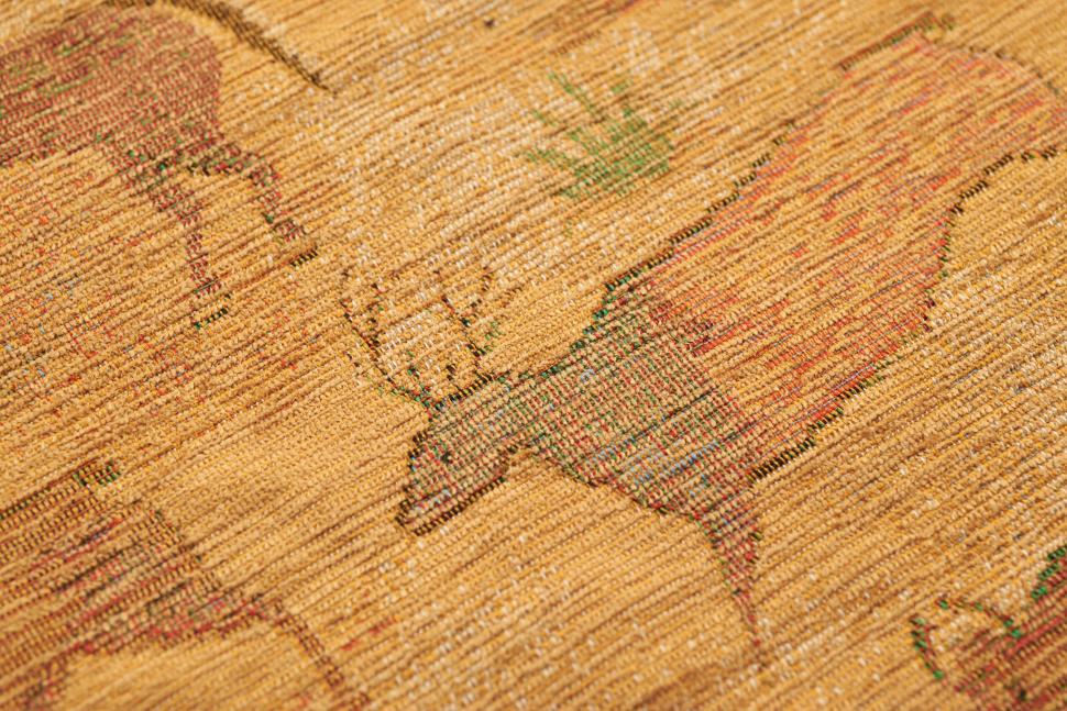Free Image of Patterned fabric with deer and grass illustrations 