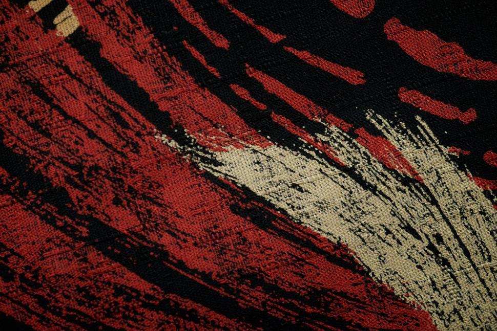 Free Image of Abstract black and red pattern with some beige strokes 