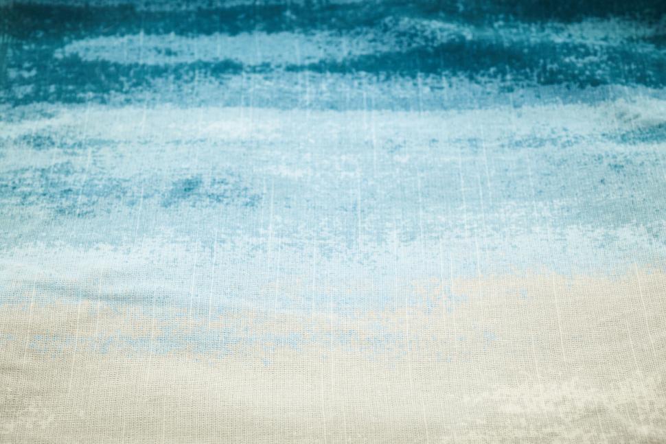 Free Image of Gradient hues of blue and white on textured fabric 