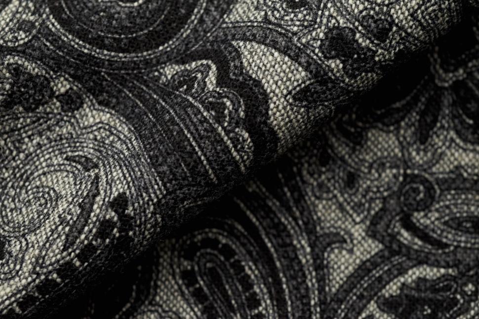 Free Image of Black and white paisley fabric creating elegant design. 