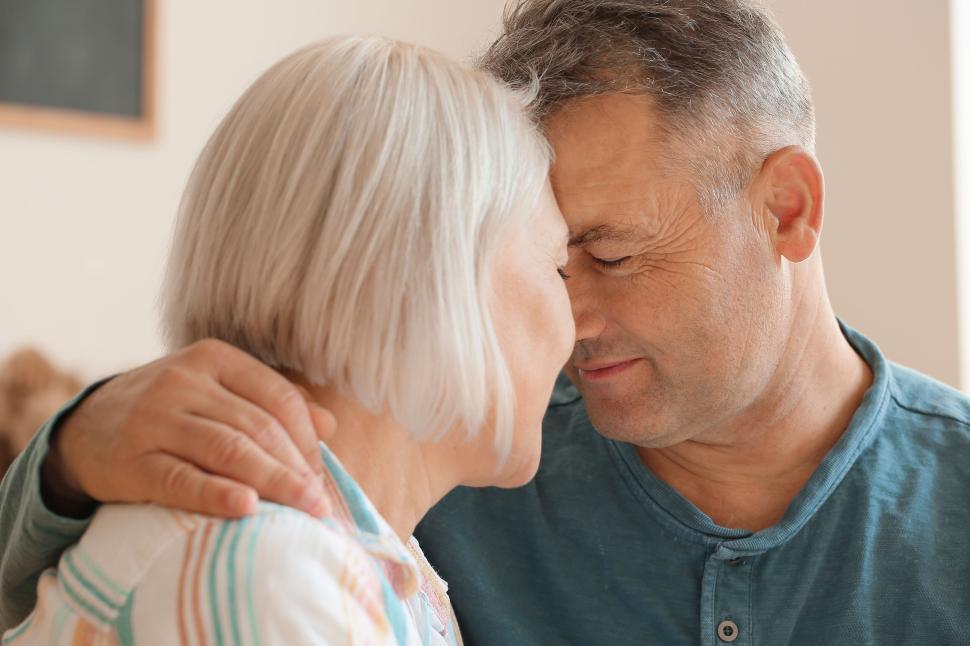 Free Image of Elderly couple sharing a tender moment indoors 