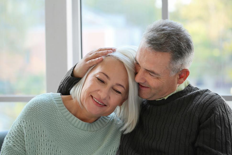 Free Image of Older couple sharing an intimate and comforting moment 