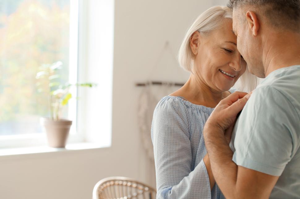 Free Image of Elderly couple sharing an intimate moment together 