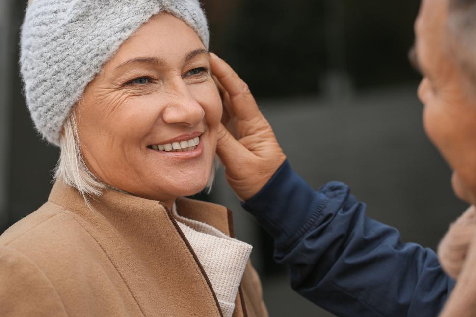 Free Image of Man lovingly touching woman s face with tenderness 
