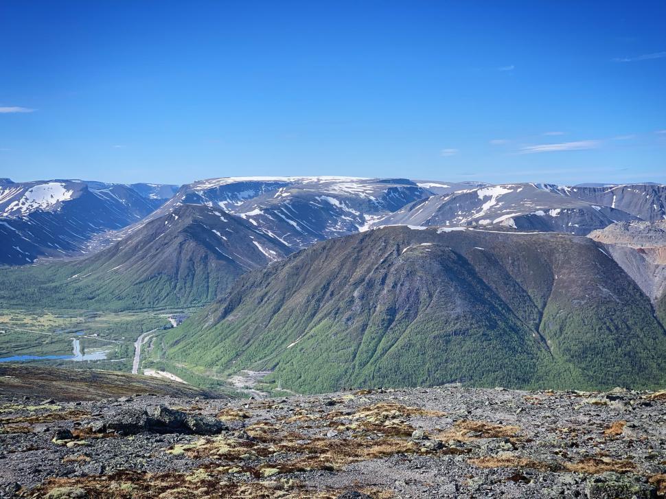 Free Image of Mountainous landscape with lush greenery and blue skies. 