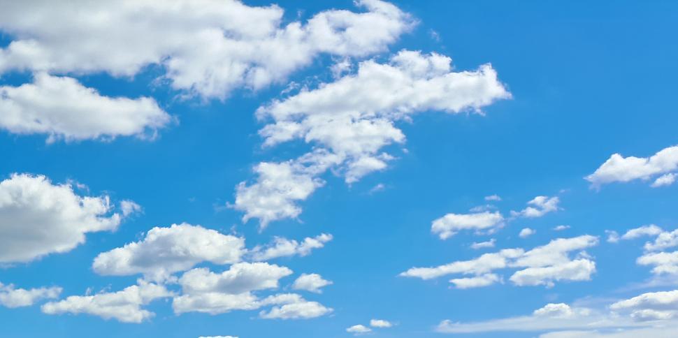 Free Image of Blue Sky Fluffy White Clouds  