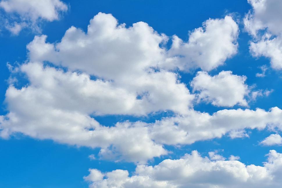 Free Image of White Clouds Against Blue Sky  