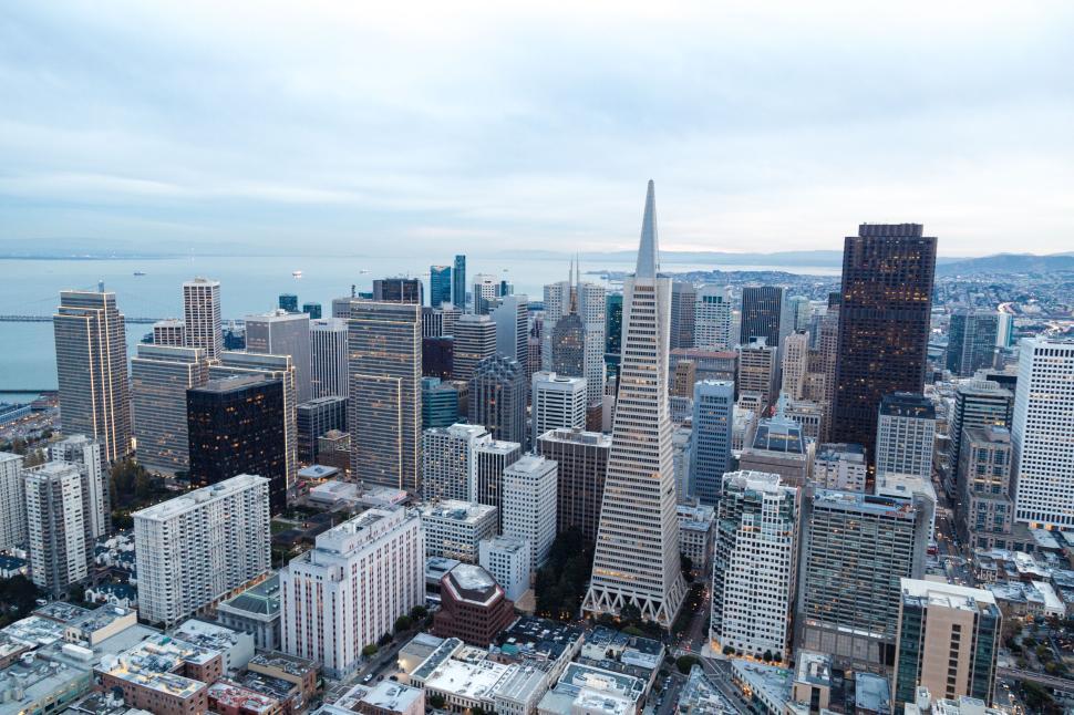 Free Image of Aerial view of a city skyline with modern skyscrapers. 