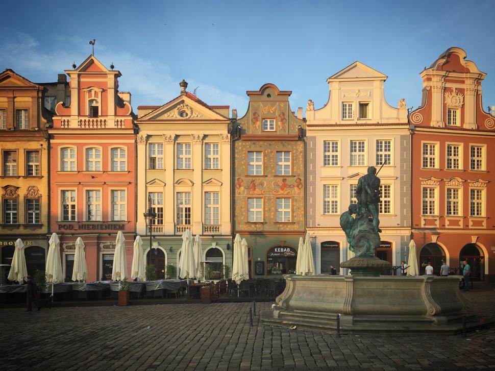 Free Image of Colorful facades of historic buildings in town square 