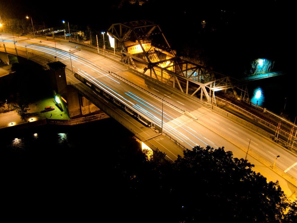 Free Image of Empty bridge illuminated by street lights at night 