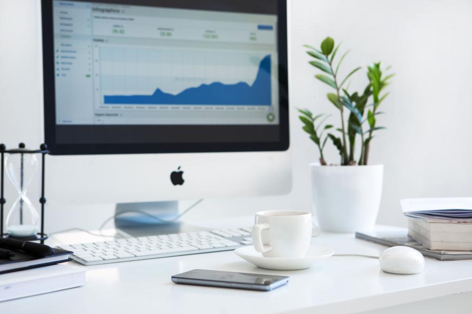Free Image of Modern workspace with computer screen and plants 