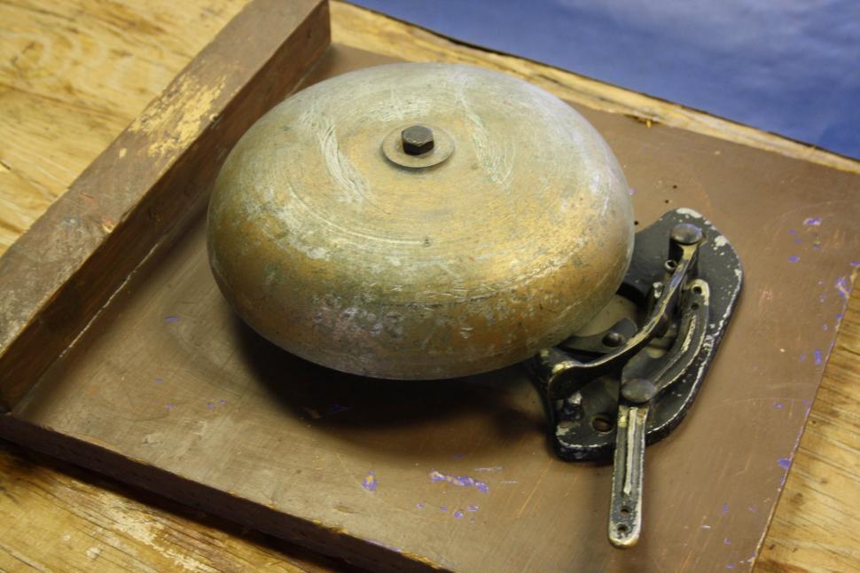 Free Image of Metal Object on Wooden Table 