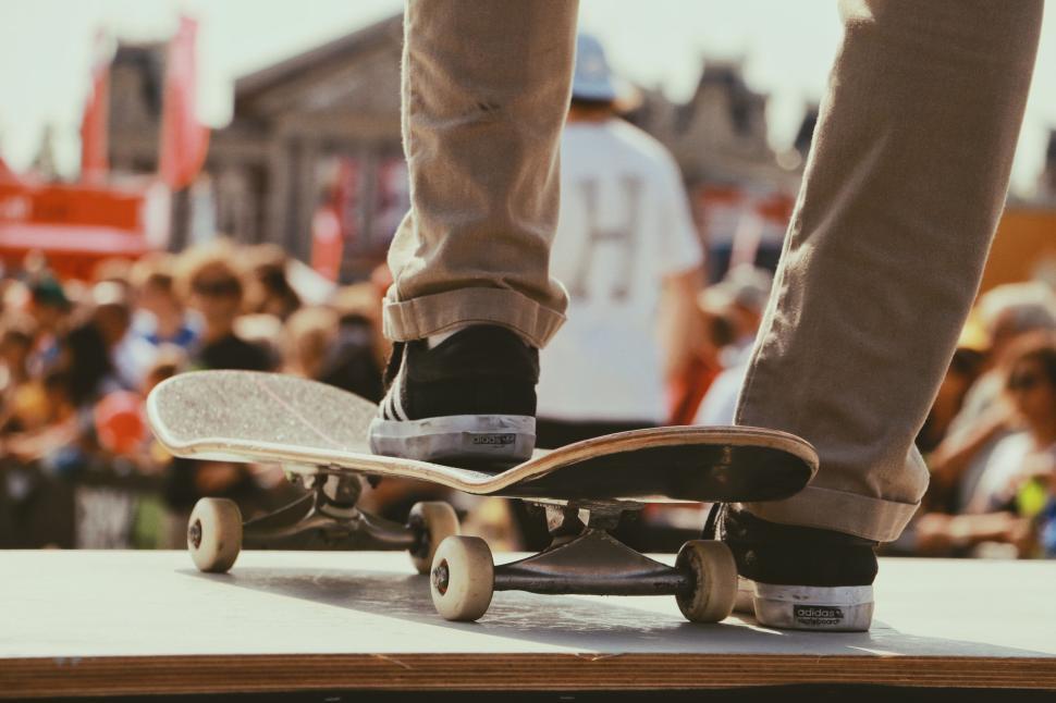 Free Image of Close-up view of a skateboarder performing a trick 