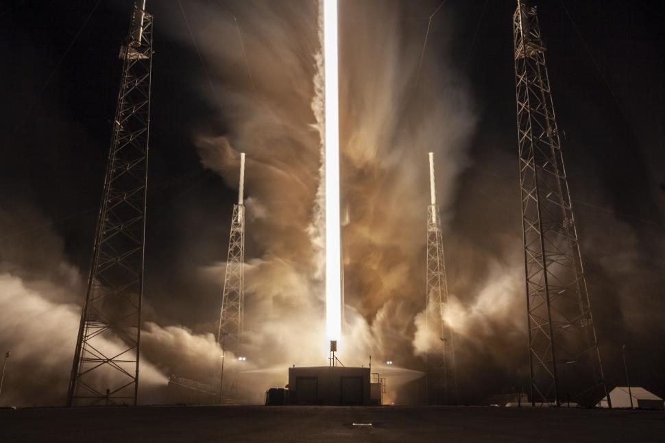 Free Image of Rocket launch creating a powerful vertical light streak 