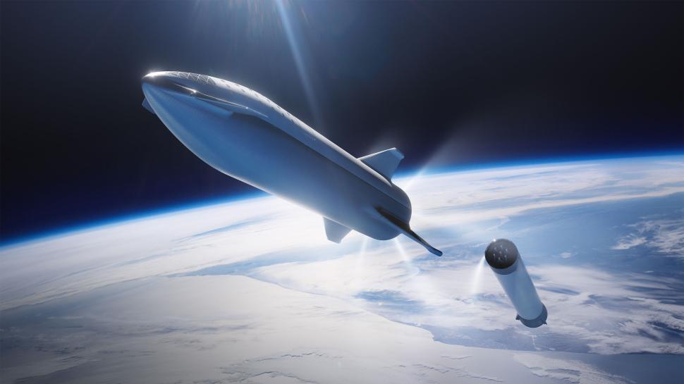 Free Image of Rocket stage separation in space with Earth backdrop 