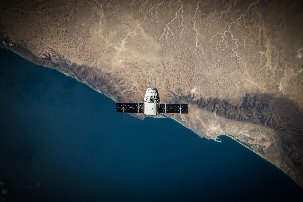 Free Image of Satellite orbiting Earth showcasing geographical detail 