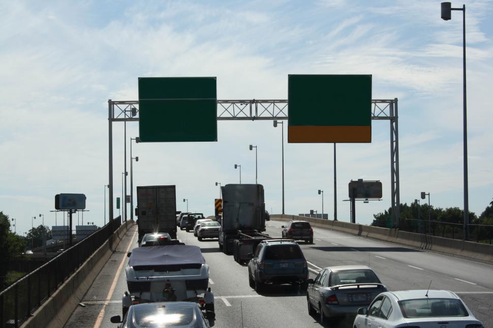 Free Image of Busy Highway Surrounded by Tall Buildings 