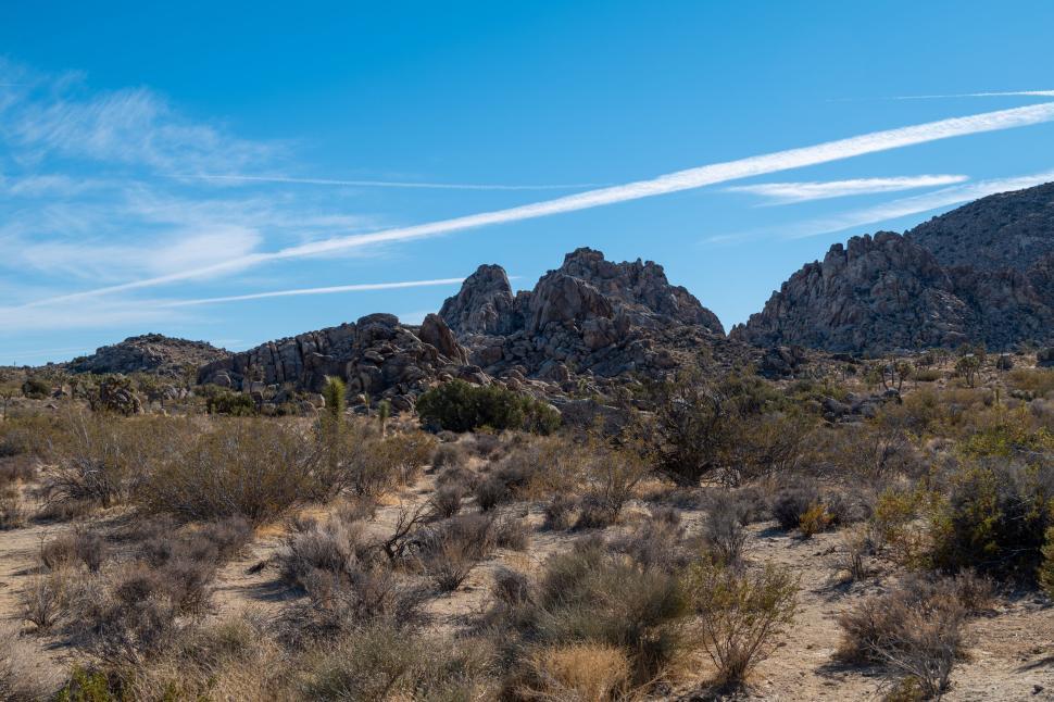 Free Image of Rocky desert landscape under clear blue sky 