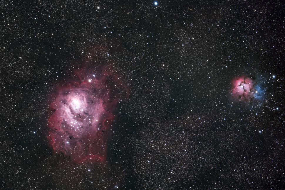 Free Image of Stunning view of nebula with stars in dark space 