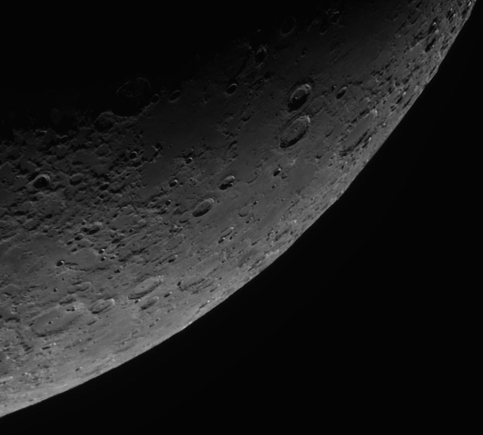 Free Image of Shadowed Lunar Surface with Craters and Ridges 