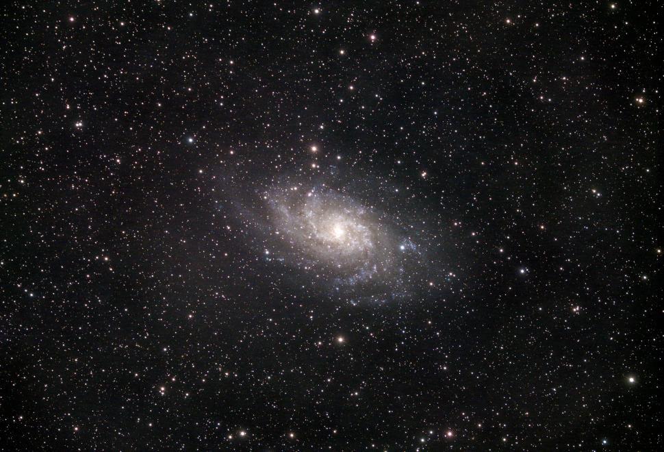 Free Image of Spiral galaxy in deep space with countless sparkling stars. 