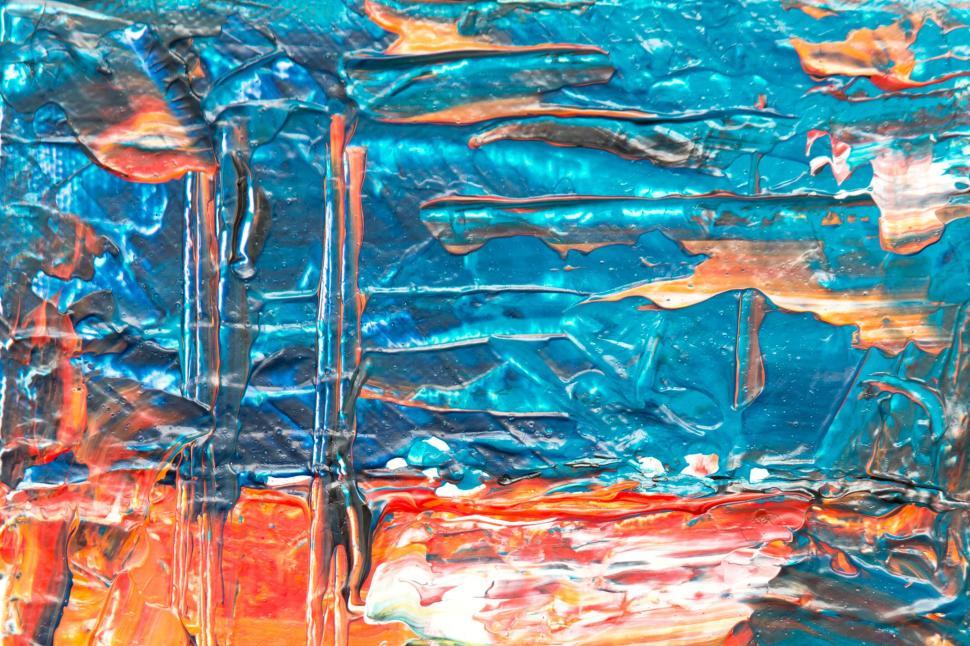 Free Image of Abstract painting with vibrant blue and orange strokes 