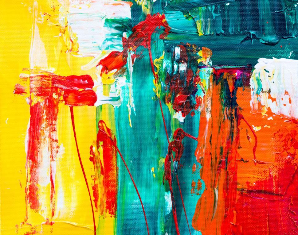 Free Image of Dynamic abstract painting with yellow, teal, and red splashes. 