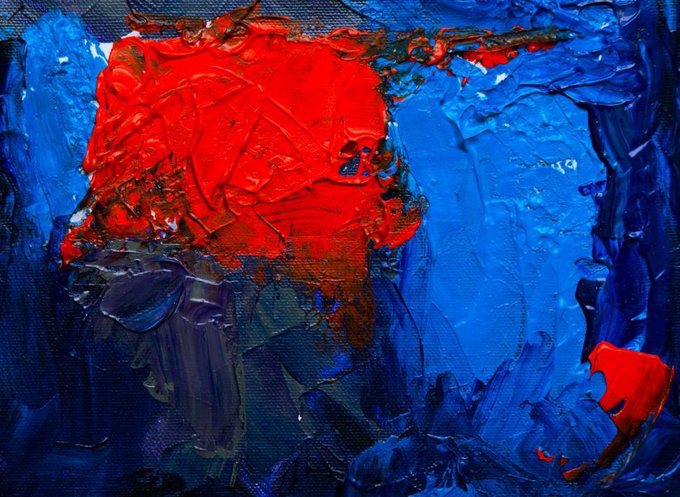 Free Image of Bold and textured abstract painting with red and blue hues 