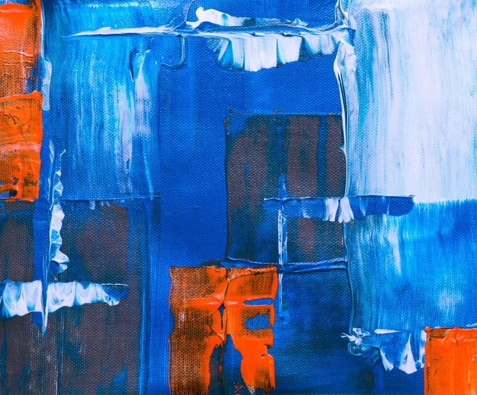Free Image of Blue and orange abstract painting with textured layers 