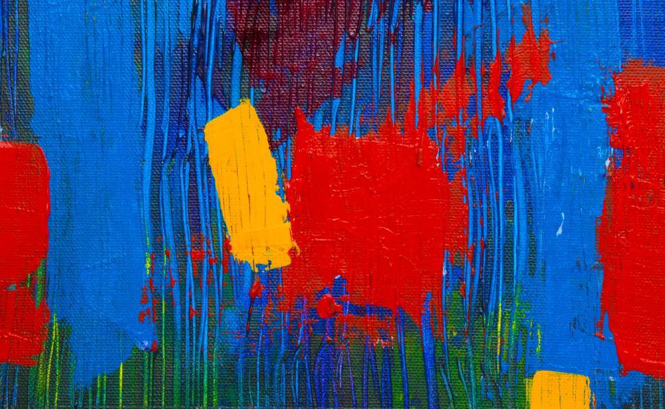 Free Image of Abstract art with blue and red paint patches and textures 