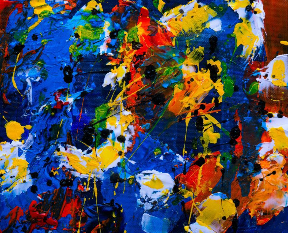 Free Image of Colorful abstract painting with splashes of vivid hues 