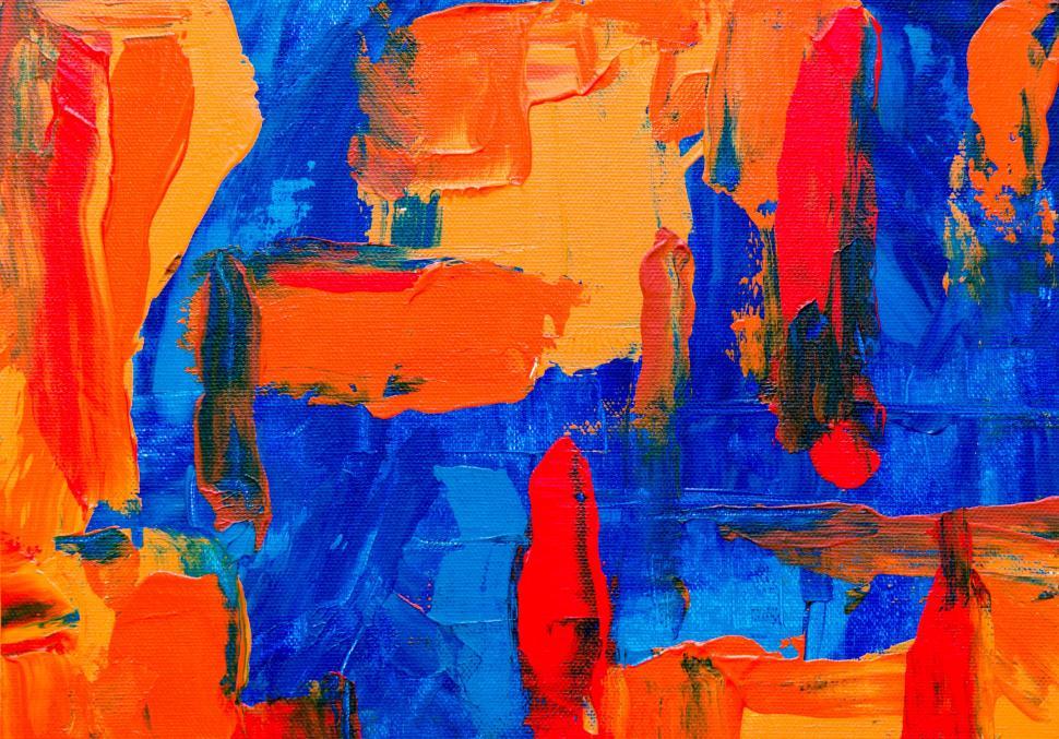 Free Image of Abstract painting with orange and blue brush strokes. 