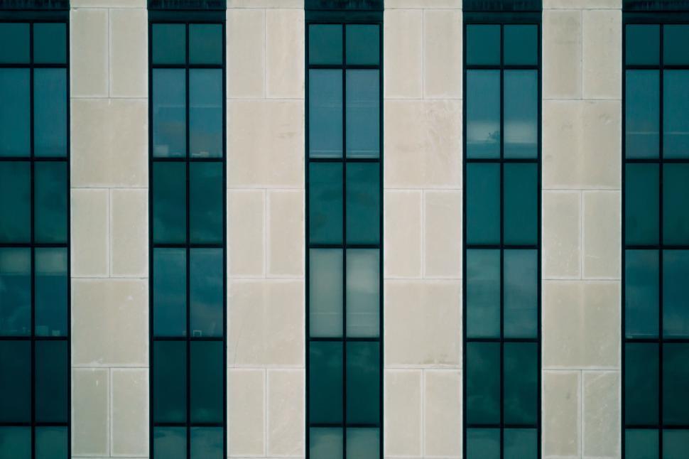 Free Image of Minimalist architectural facade with vertical windows. 
