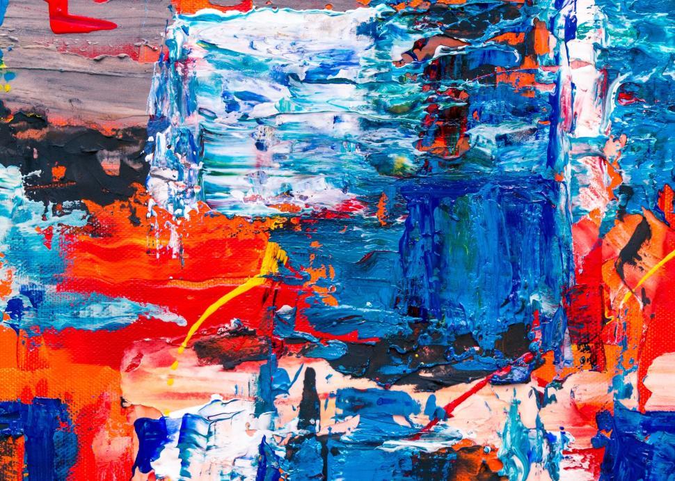 Free Image of Textured abstract painting with a mix of vibrant blue hues 