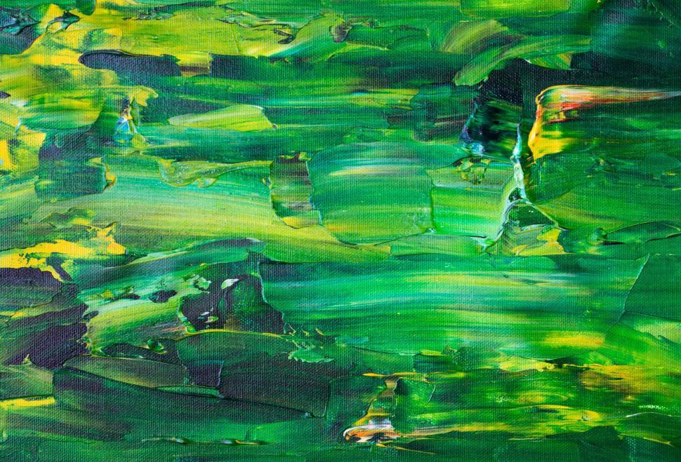 Free Image of A vibrant mix of green abstract brushstrokes on canvas 