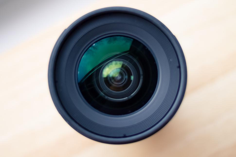 Free Image of Close-up view of a camera lens with reflection detail 