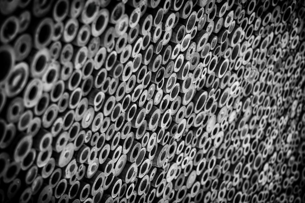 Free Image of Abstract close-up of group of pipes forming a pattern 