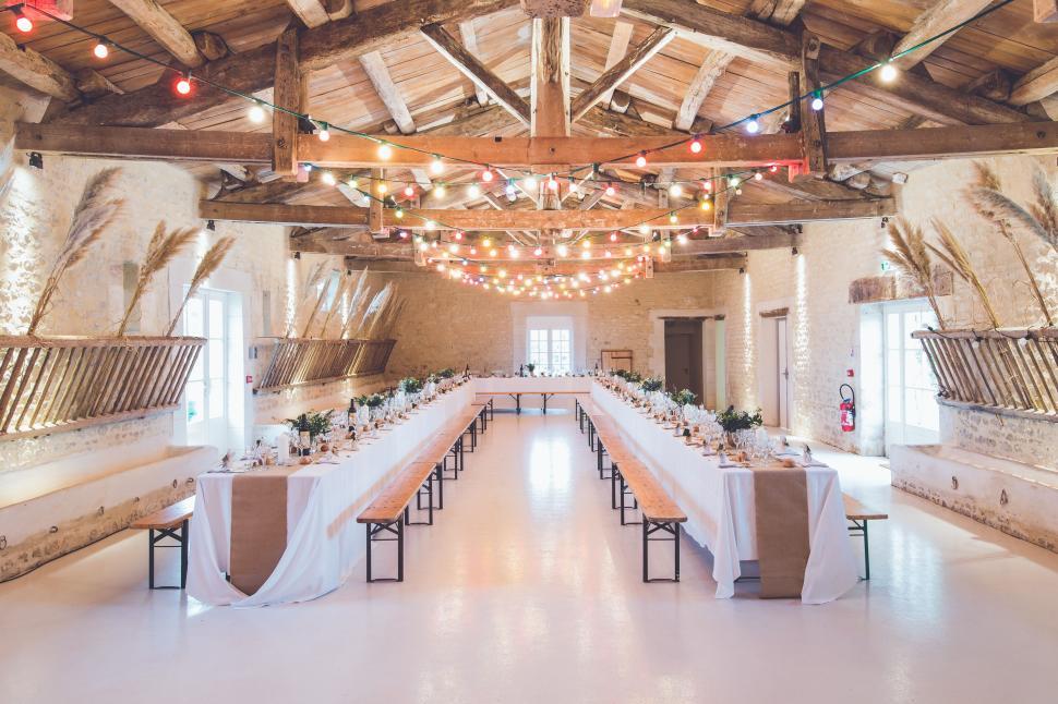 Free Image of Beautifully decorated rustic hall for a ceremony. 