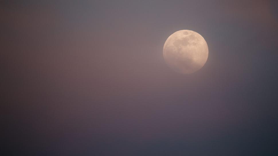 Free Image of Full moon shining brightly in the night sky 