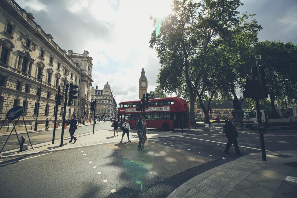 Free Image of Busy London street with iconic red double-decker bus. 