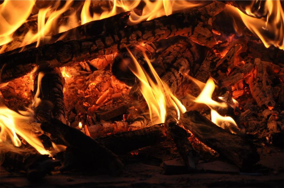 Free Image of Close-up of colors and textures of burning firewood 