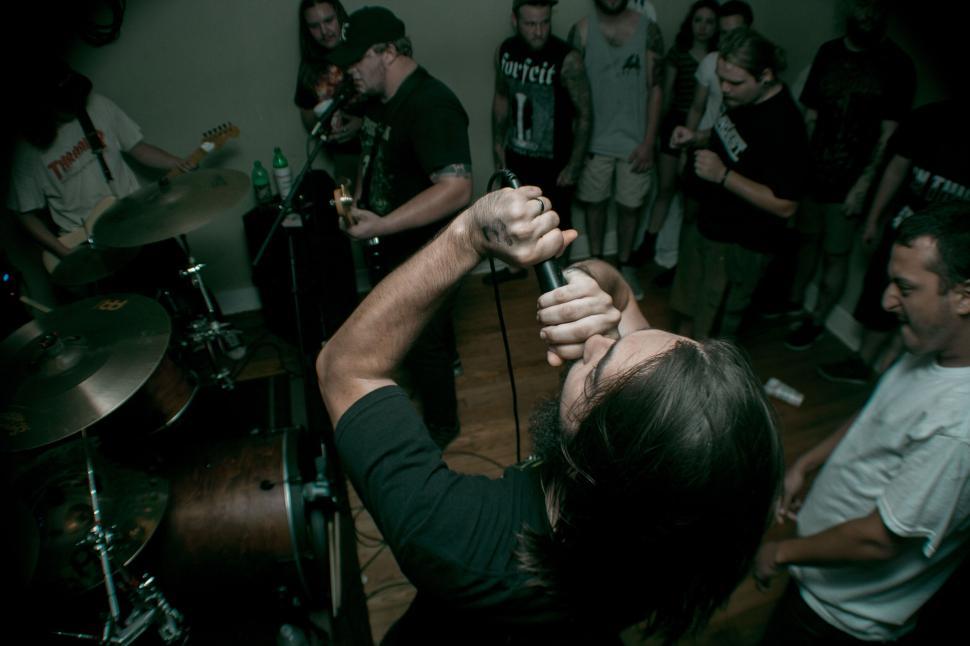 Free Image of Live music performance by a band in an intimate venue 