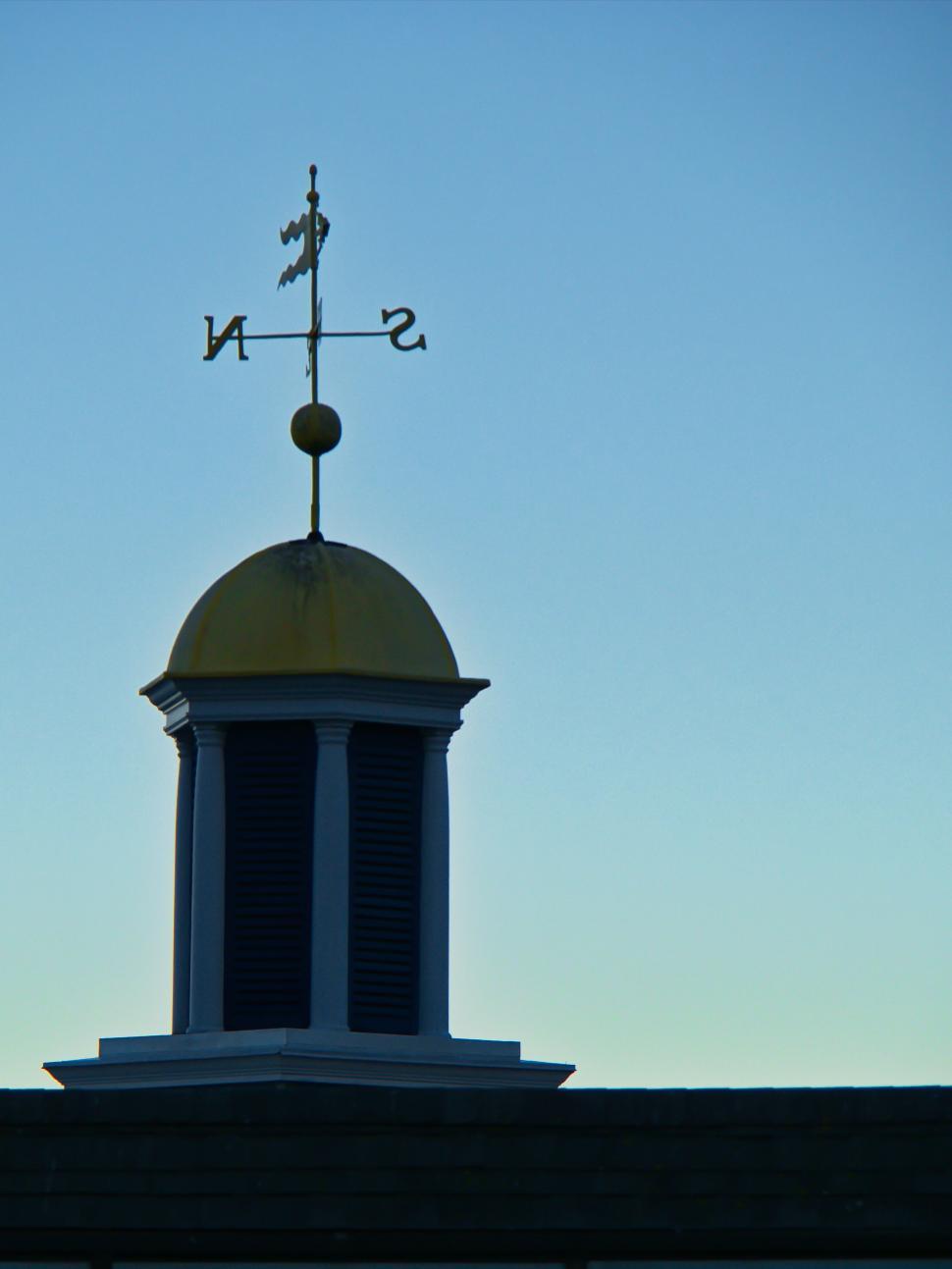 Free Image of Golden Cupola With Weather Vane Against Blue Sky 
